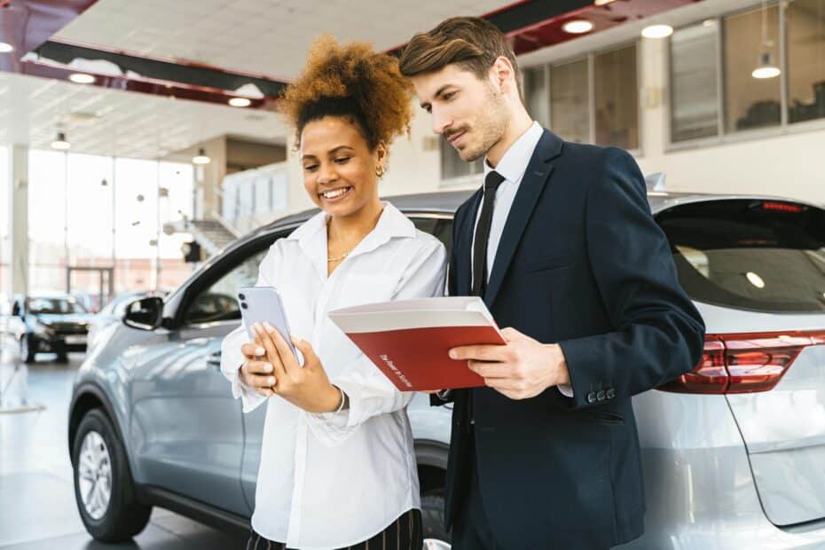 A dealership manager analyzing MarketChecks data for used car trends and pricing insights