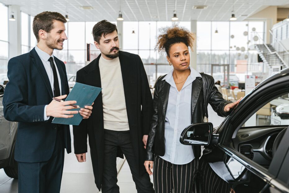 Car dealership manager analyzing MarketCheck data for pricing and inventory optimization.